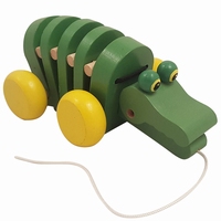 Trek krokodil groen met gele wielen 